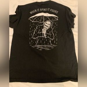 When it rains, it pours T shirt in Large